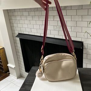 Cream crossbody bag in great condition.
